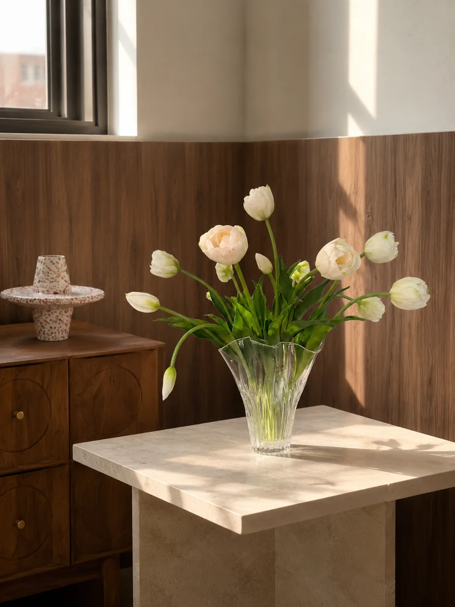 Airy white artificial tulip arrangement in a handcrafted clear glass vessel, PO002