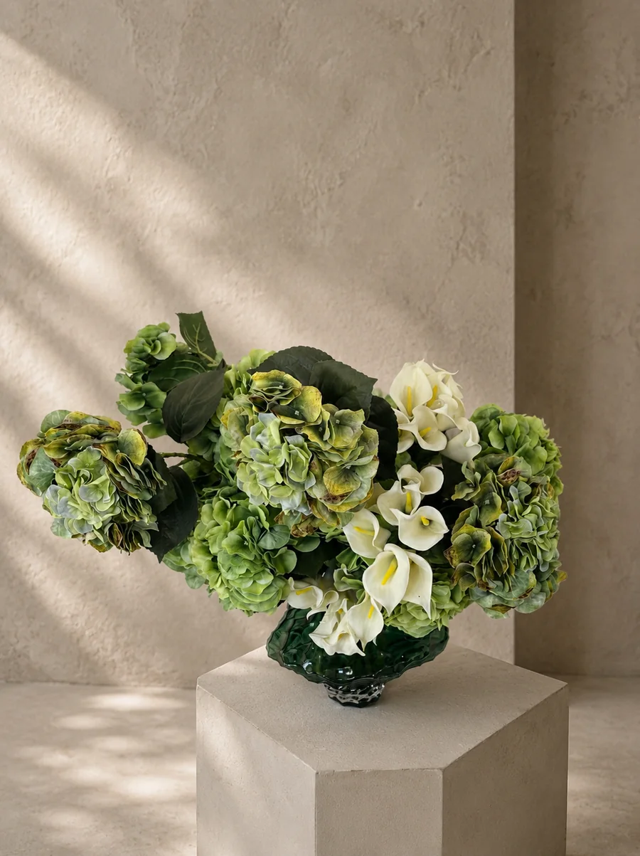 Large green and white artificial hydrangea and calla lily arrangement in a handcrafted glass vessel, PO007